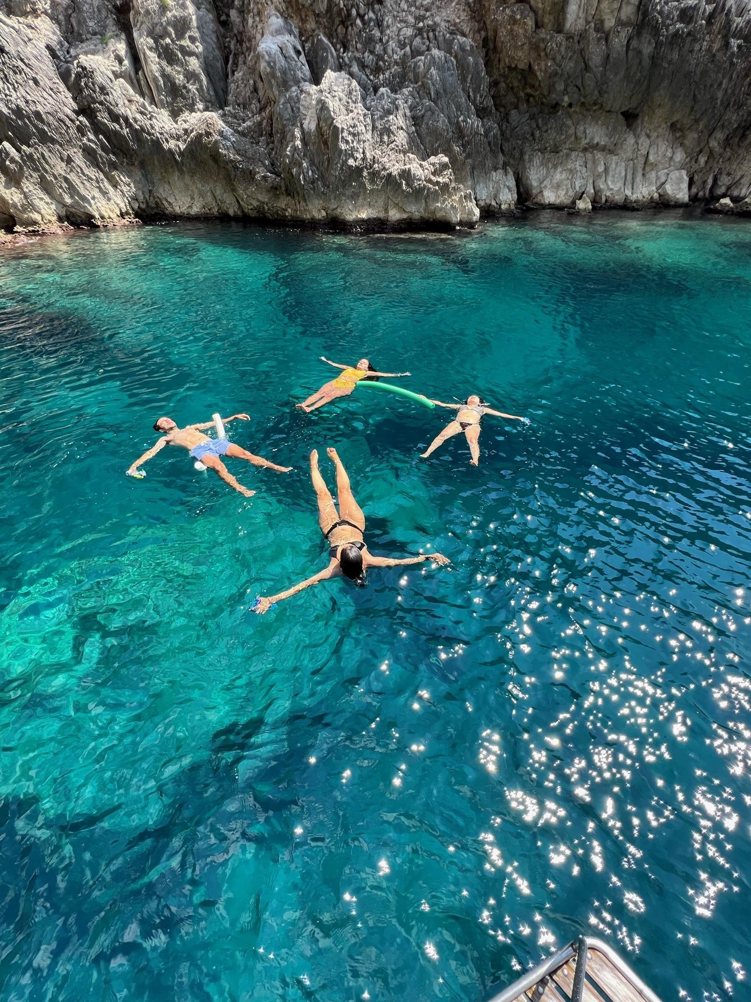 Capri Private Boat Tour: Faraglioni, Sea Caves & Swimming Stops