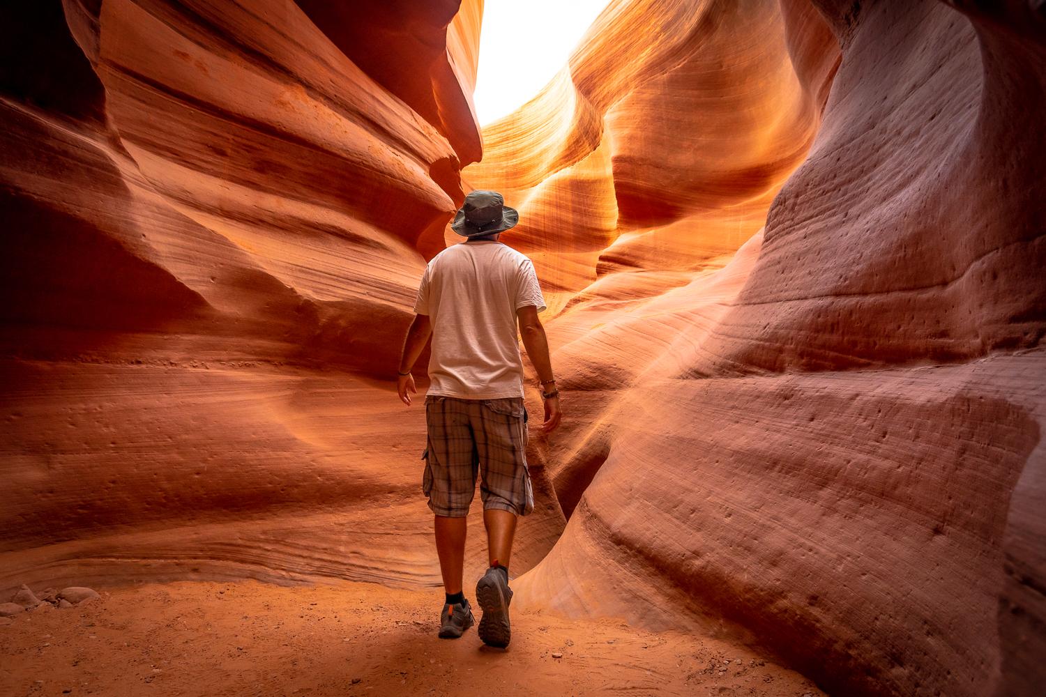 Flowing red and gold rock textures inside Lower Antelope Canyon
