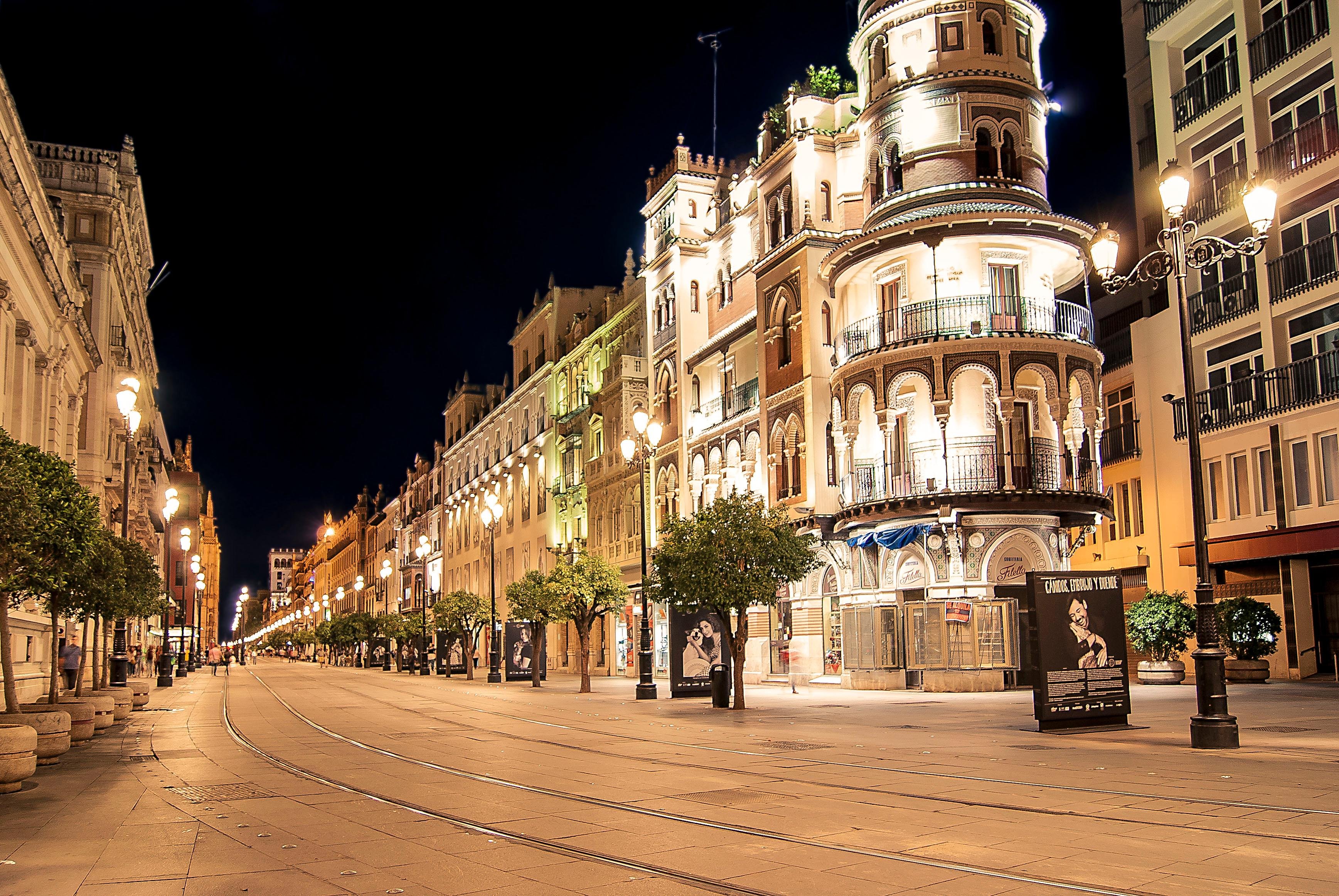 Seville Nocturnal Discovery: Historic Center & Riverside Walk