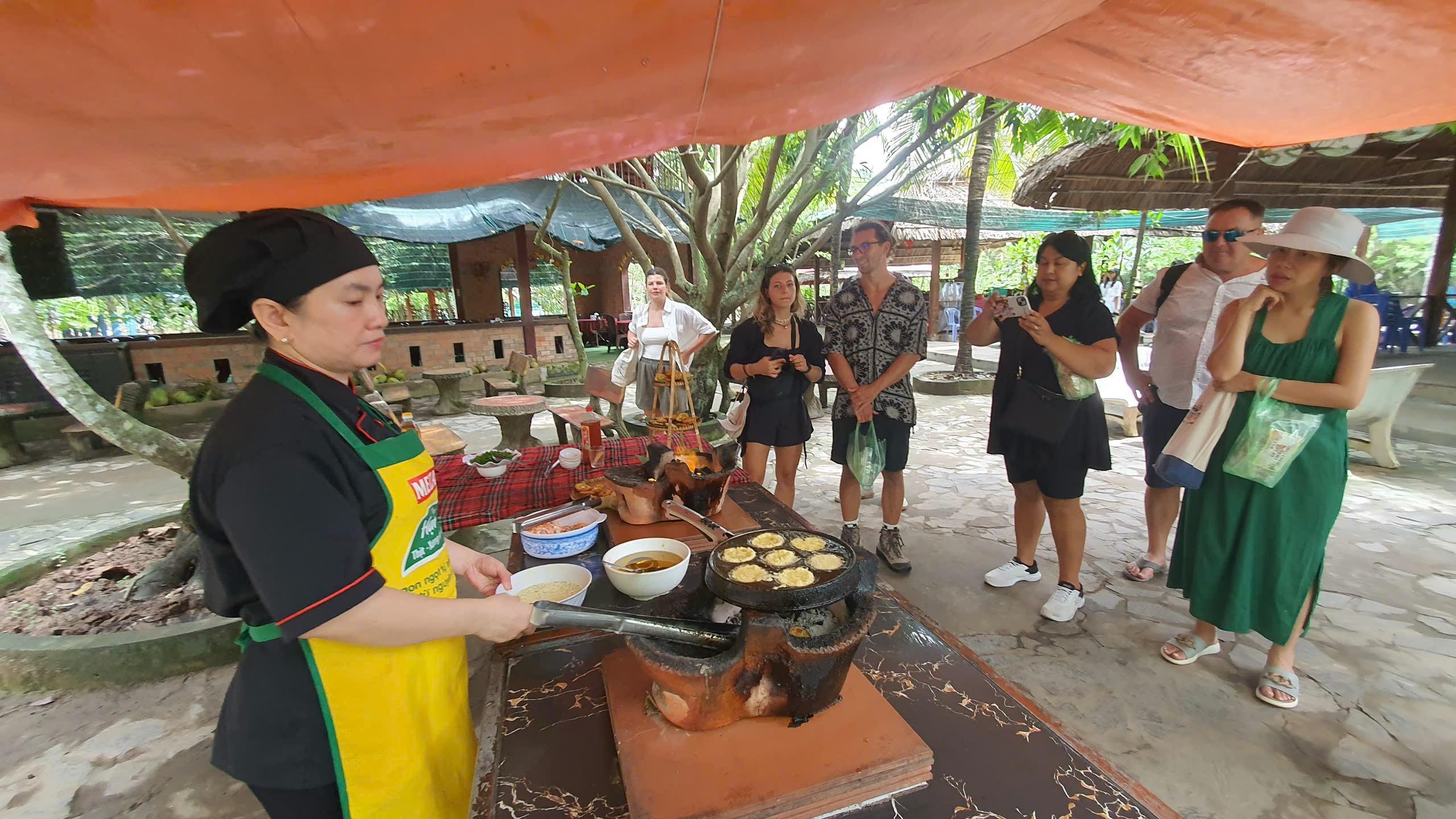 Cu Chi Tunnels, Mekong Delta & Coconut Village Day Tour from Ho Chi Minh City