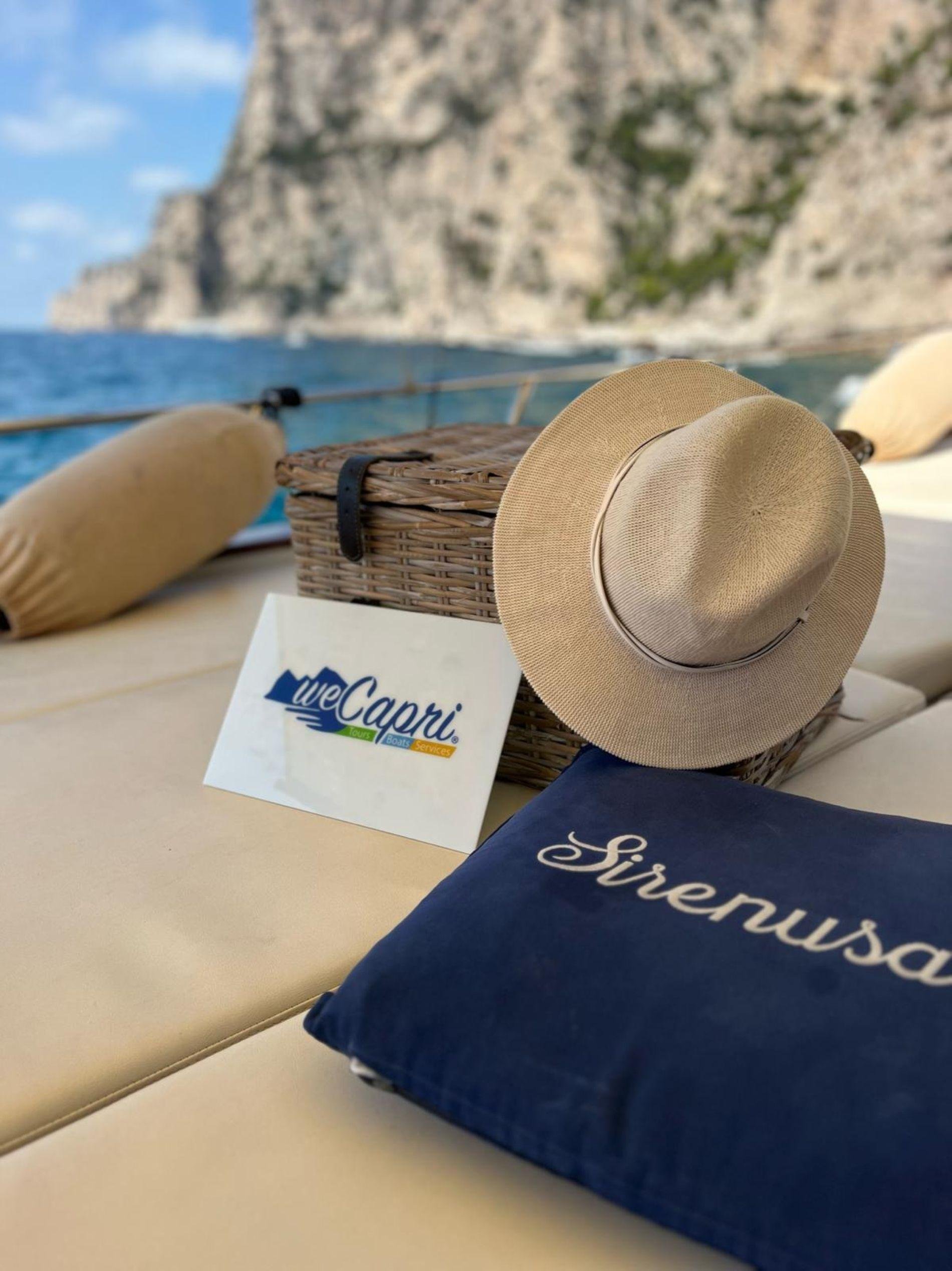 Capri Private Boat Tour: Faraglioni, Sea Caves & Swimming Stops