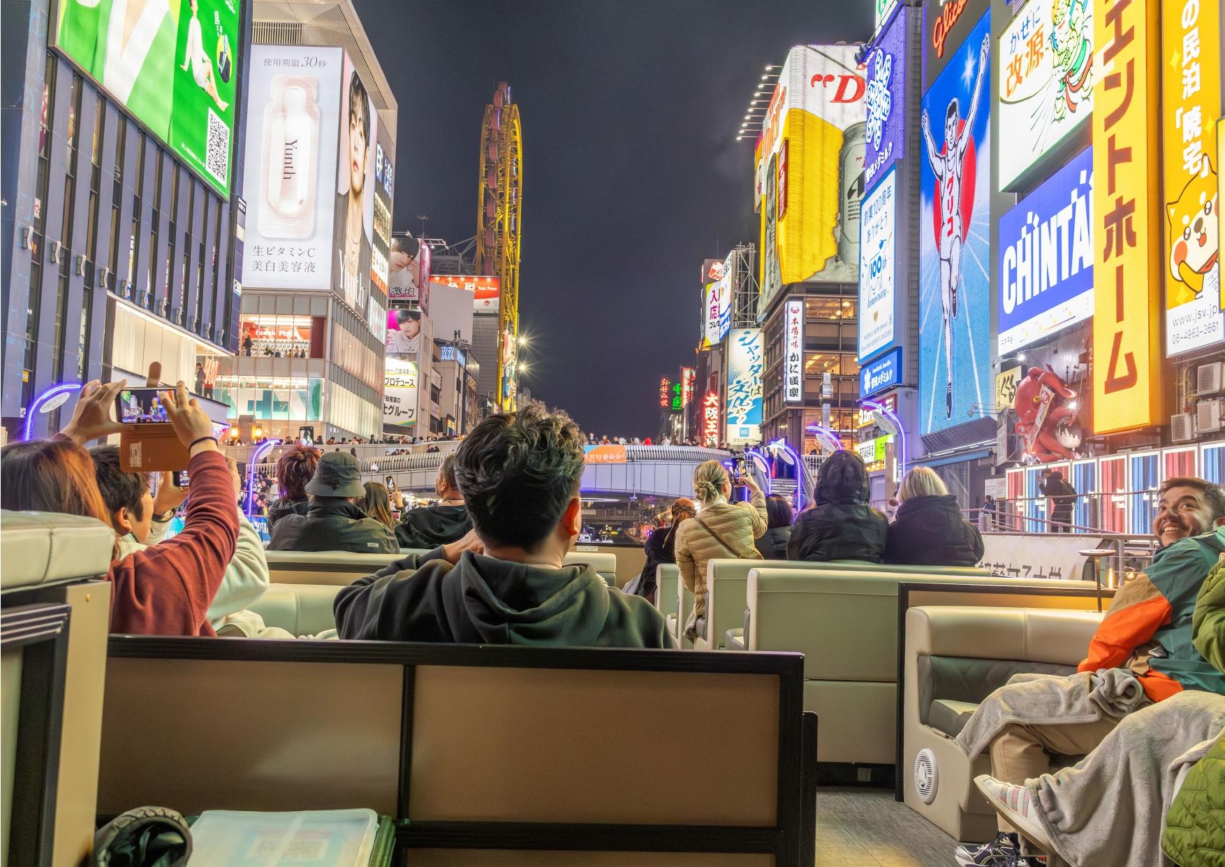 Dotonbori river cruise — Glico sign and neon on the Osaka canal — image 4