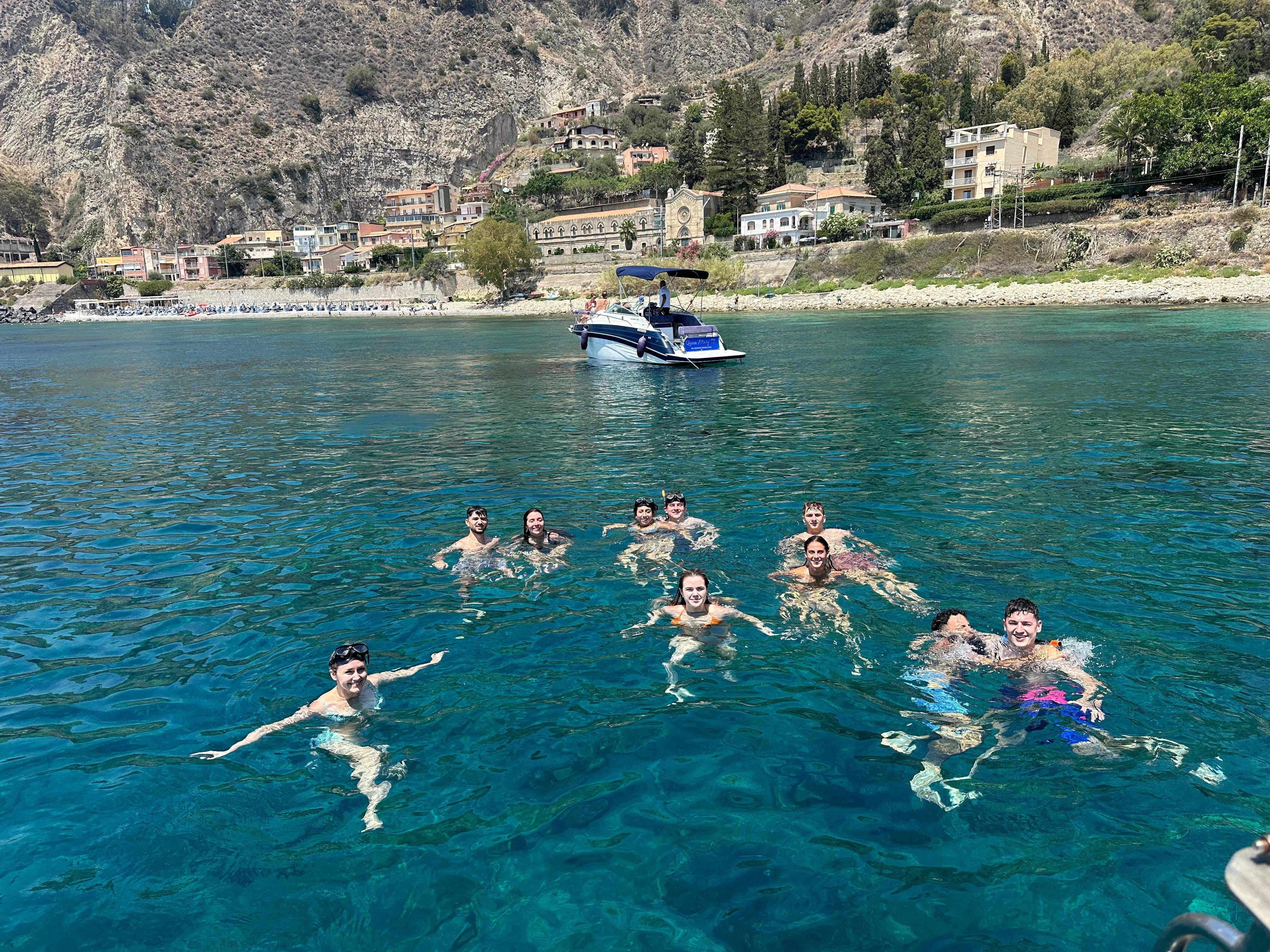 Taormina Coast Boat Cruise with Sicilian Wine & Snorkeling