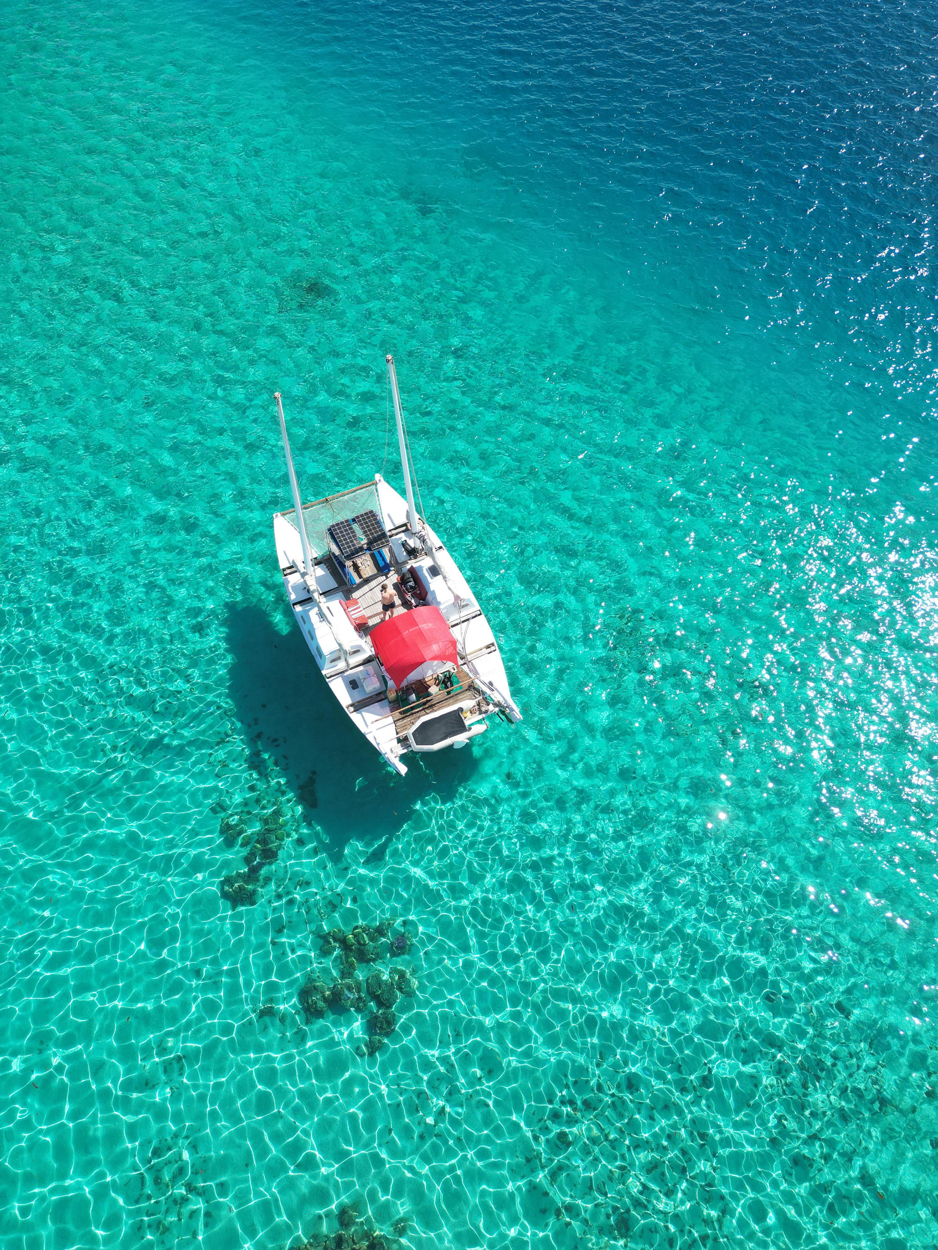 Traditional Canoe Sailing Adventure in Tahiti's Lagoon
