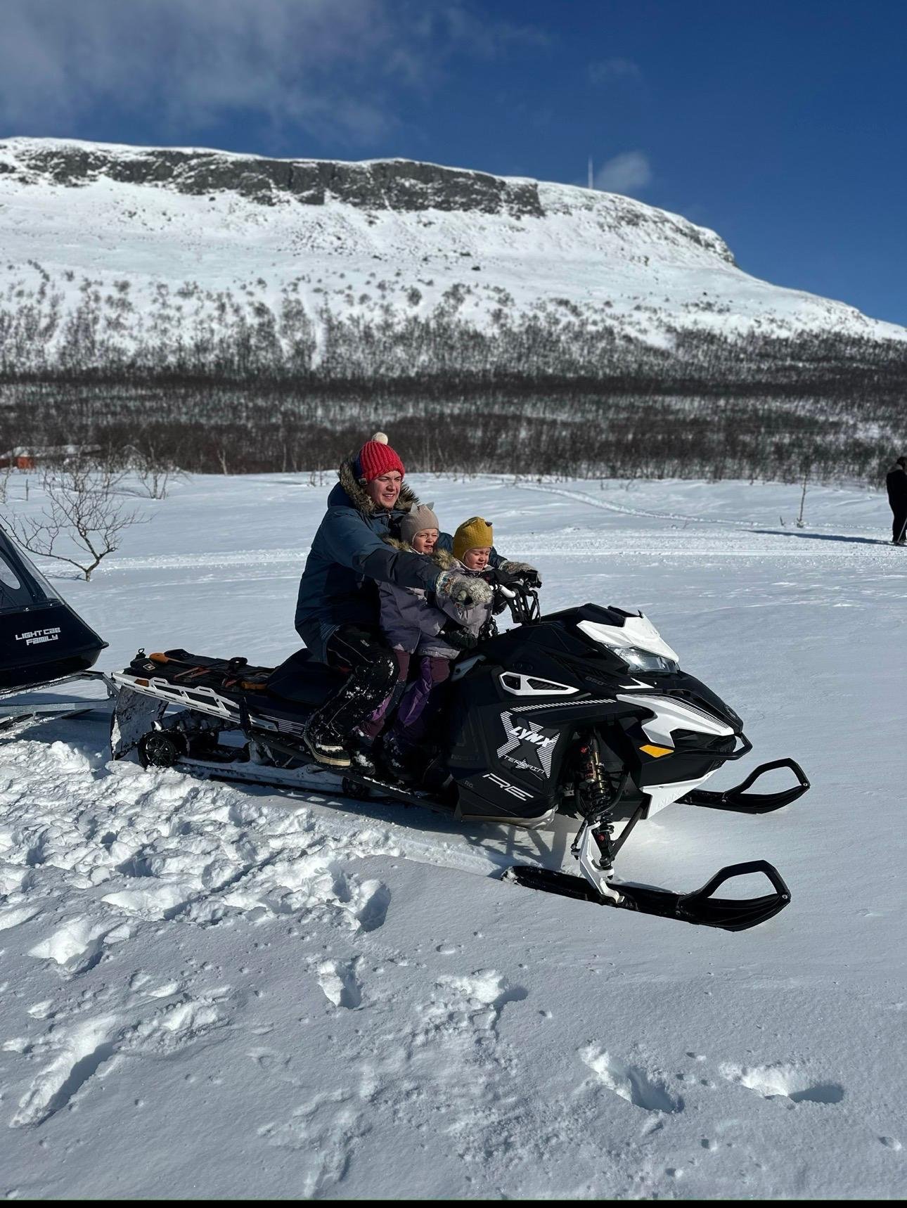 Tromsø to Kilpisjärvi: Snowmobile Safari, Ice Fishing & Arctic Campfire