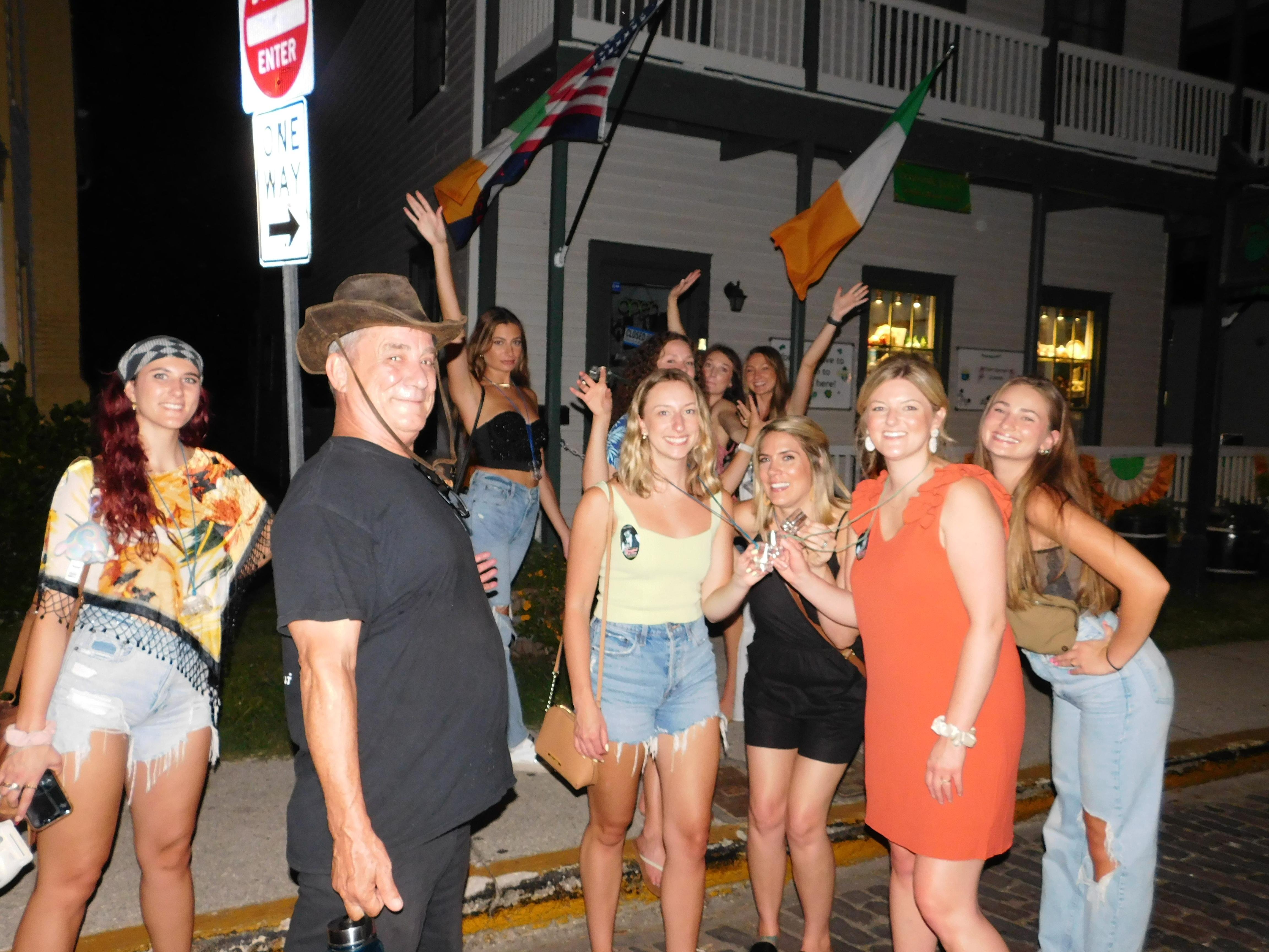 St Augustine ghost tour group after dark — heritage pub crawl through Florida's most haunted city