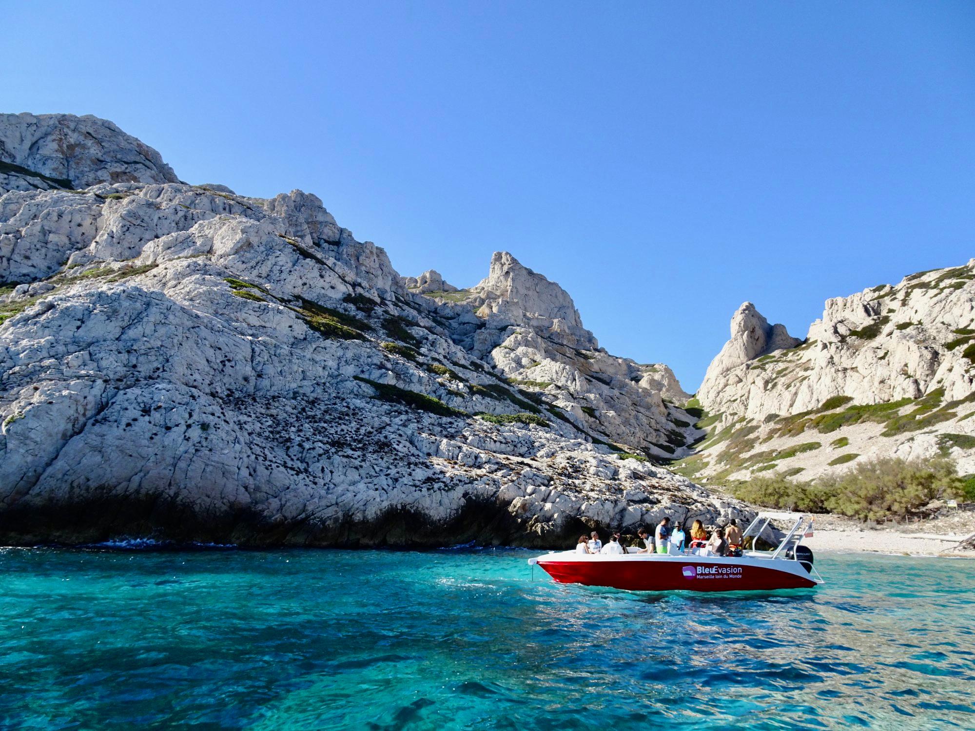 Swimming in the Calanques National Park on a guided boat tour — crystal-clear turquoise water near Cassis