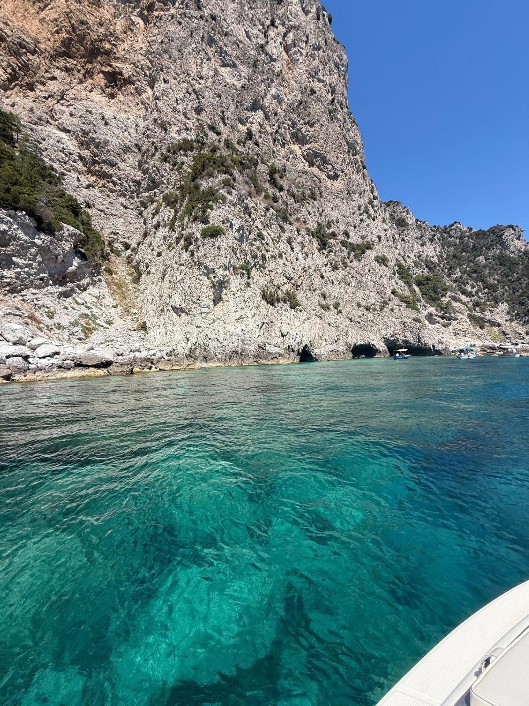 Capri Private Boat Tour: Faraglioni, Sea Caves & Swimming Stops