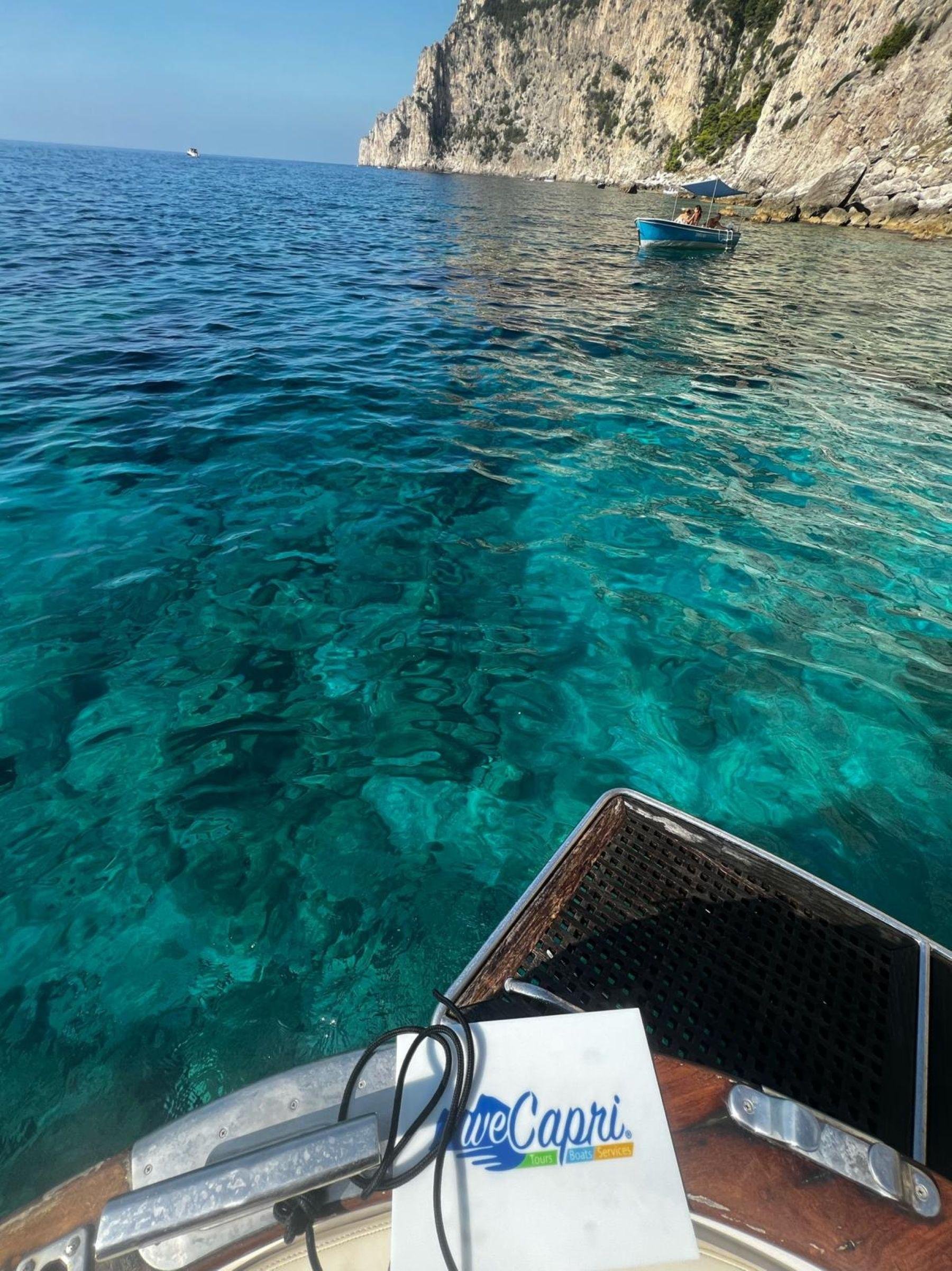 Capri Private Boat Tour: Faraglioni, Sea Caves & Swimming Stops