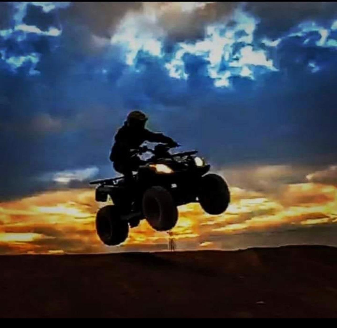 Agafay Desert Adventure: Quad Biking, Camel Ride & Berber Dinner Show