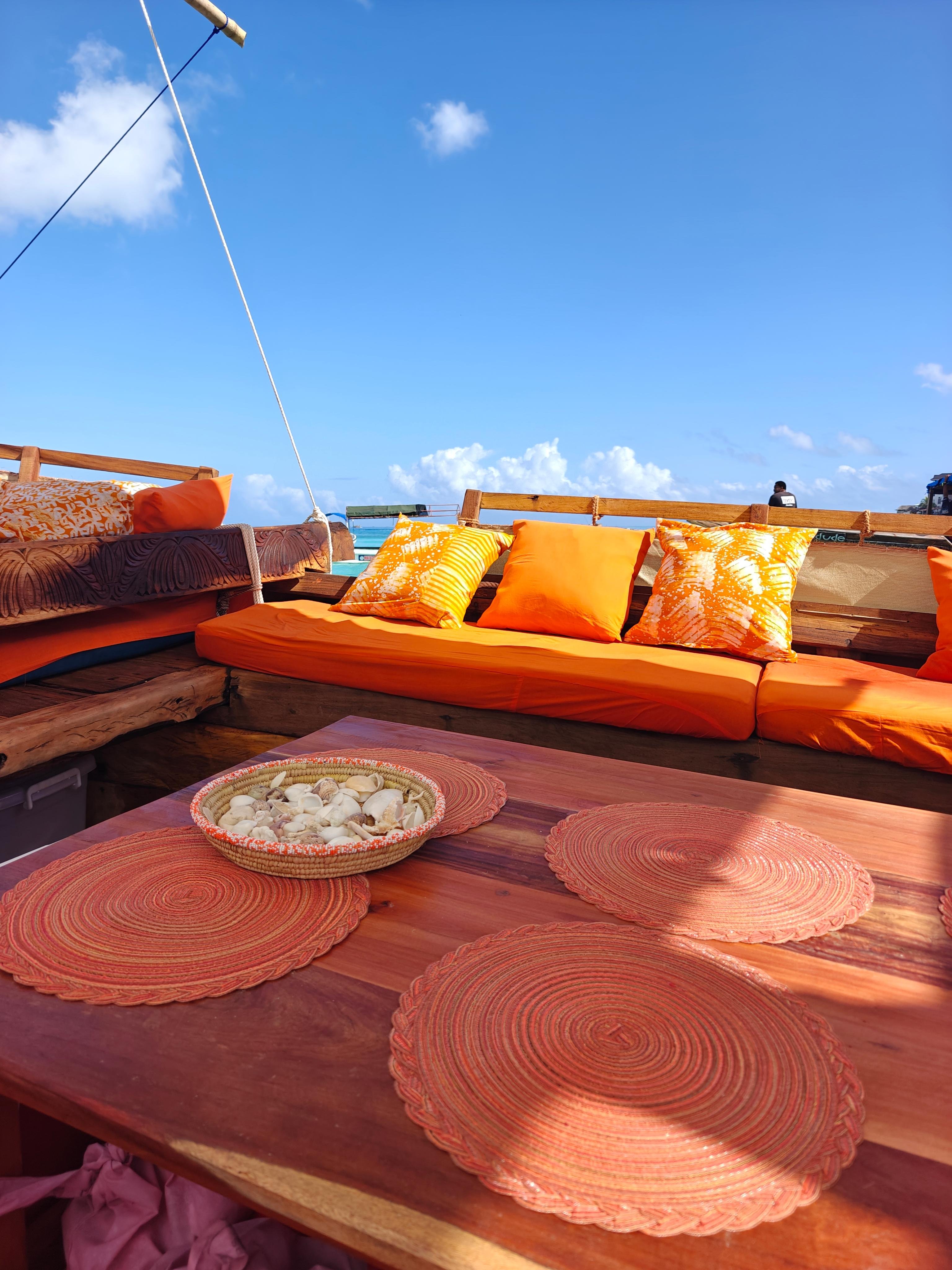 Mnemba Island Full-Day Dhow Sail: Dolphins, Snorkeling & BBQ