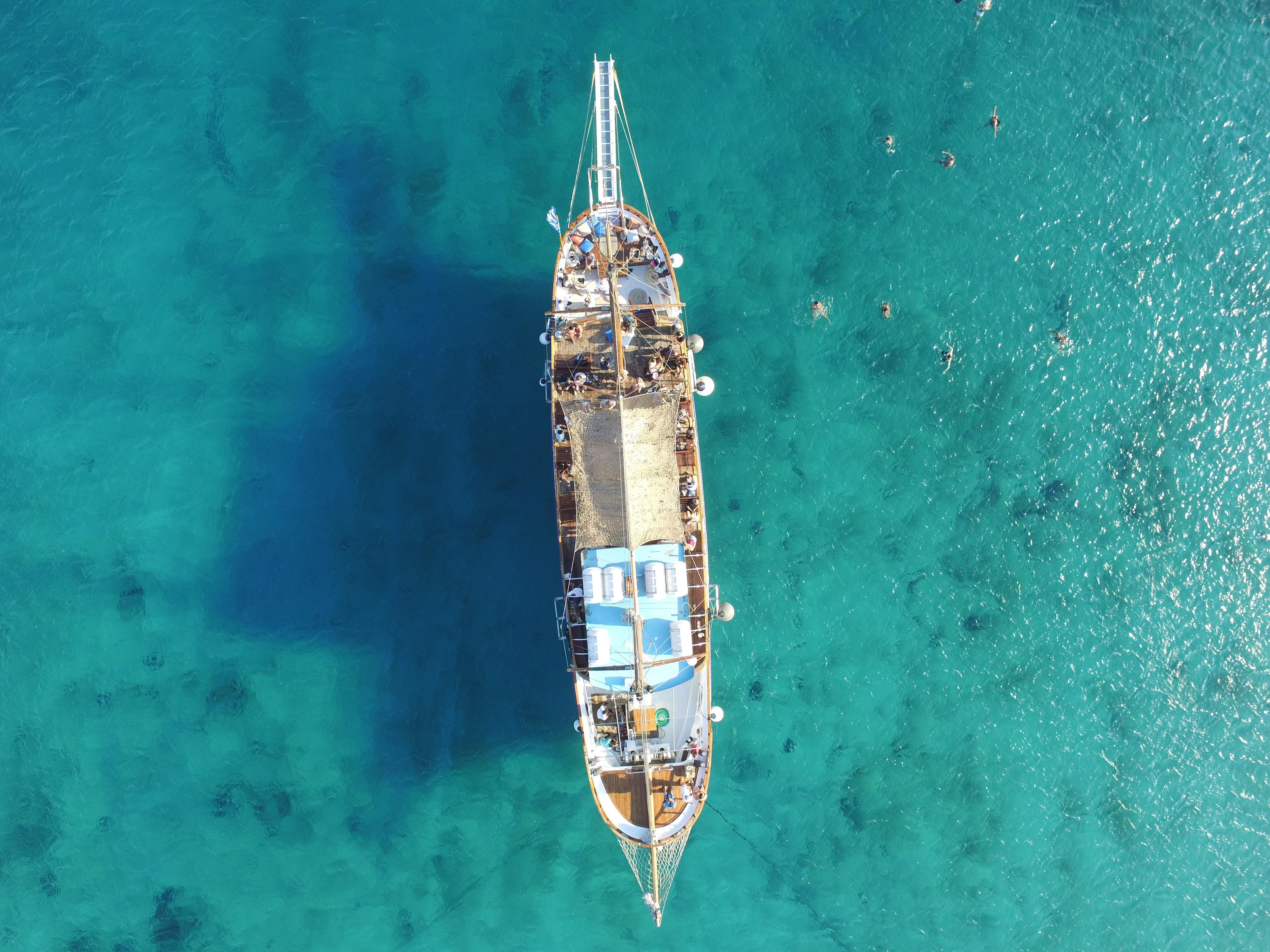 Mykonos Island Hopping: Delos Ruins & Rhenia Beach BBQ