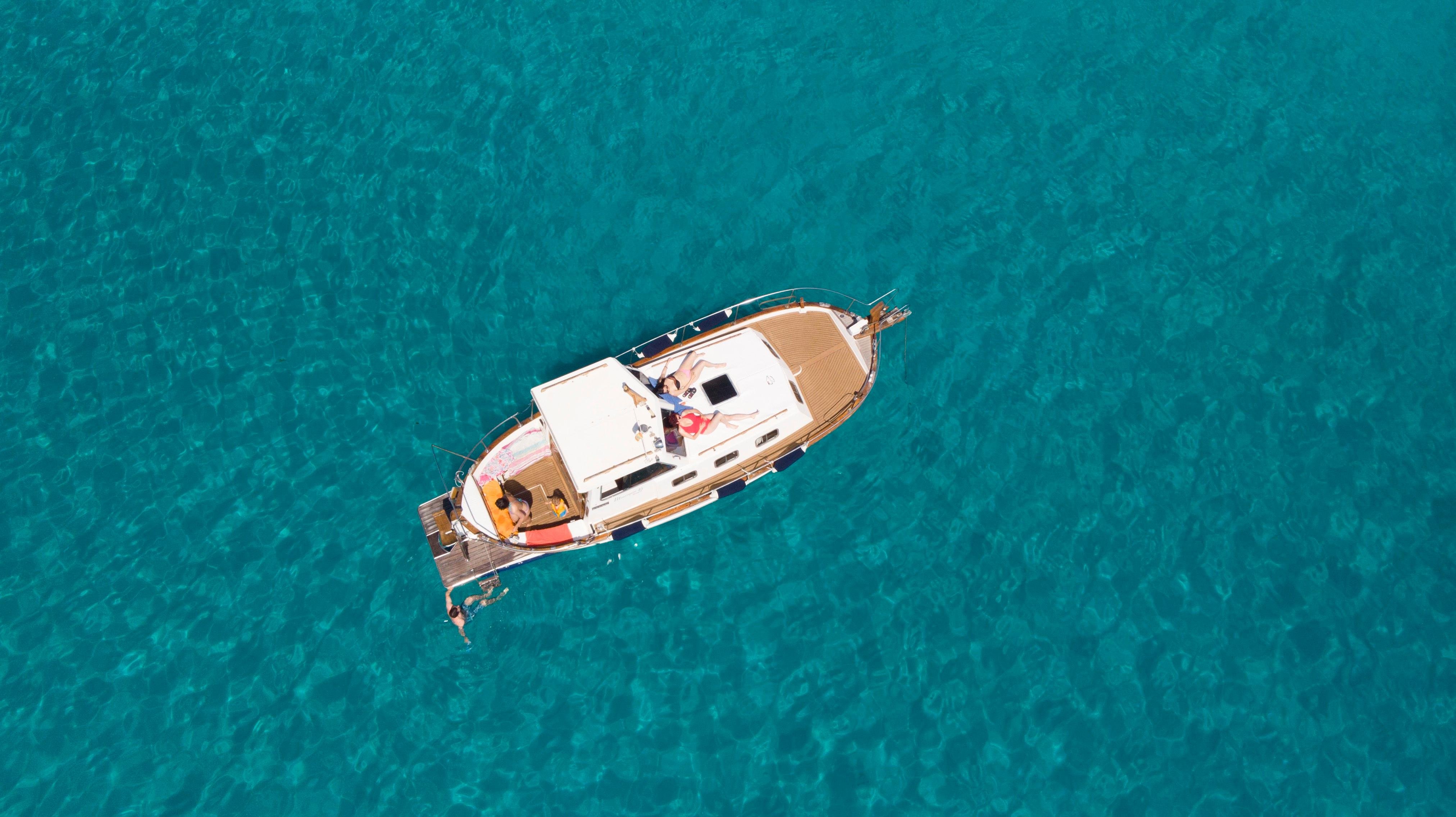 Menorca boat tour — turquoise calas and coastline from the water — image 10