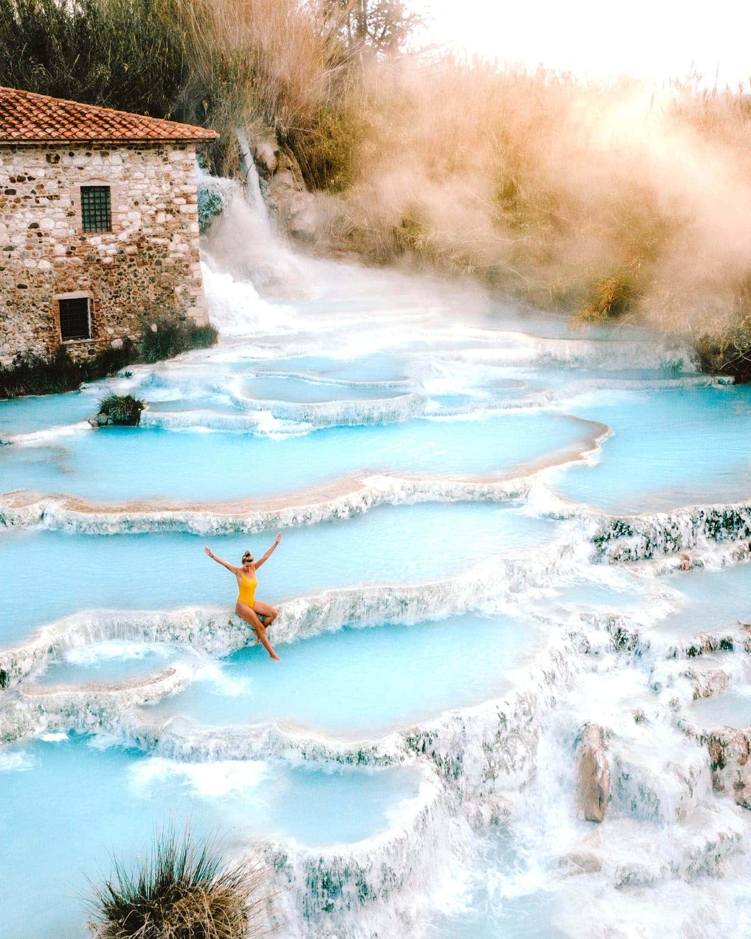 Travertine terraces and steaming pools at the Saturnia hot springs, southern Tuscany