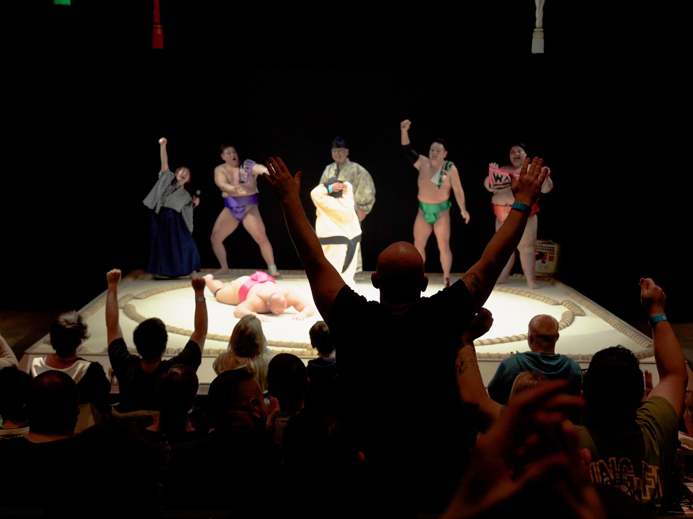 Sumo Performance and Dining Experience at Osaka's Hirakuza Hall
