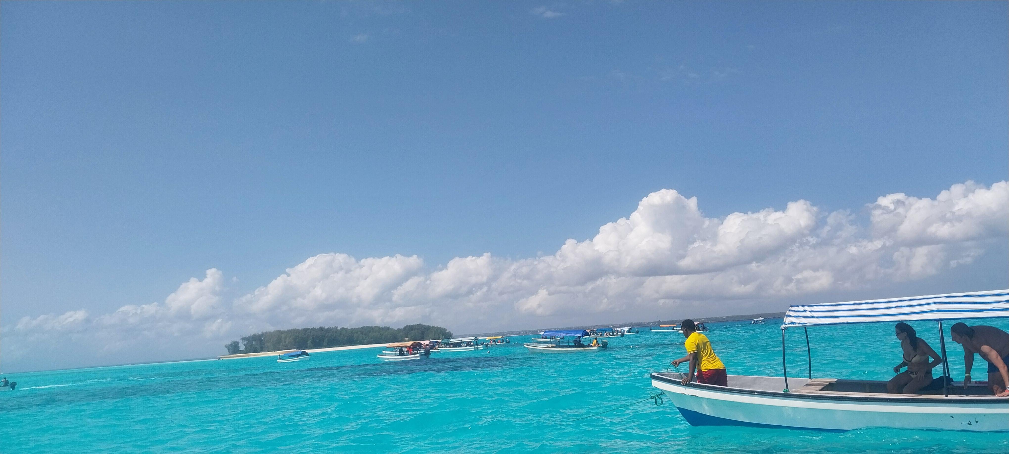 Zanzibar: Mnemba Island Dolphin Swim & Snorkel Adventure