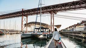 Lisbon sunset boat tour on a catamaran with welcome drink