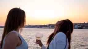 Lisbon Tagus River sunset tour with snacks and drink