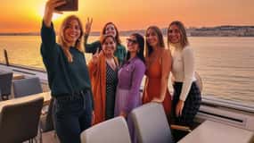 Lisbon sunset cruise with welcome drink and snacks