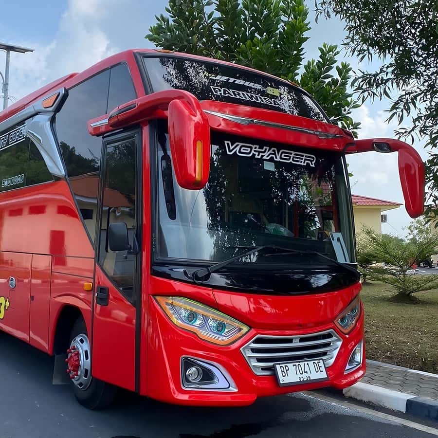 Tourist bus crossing Barelang Bridge during Batam city tour.