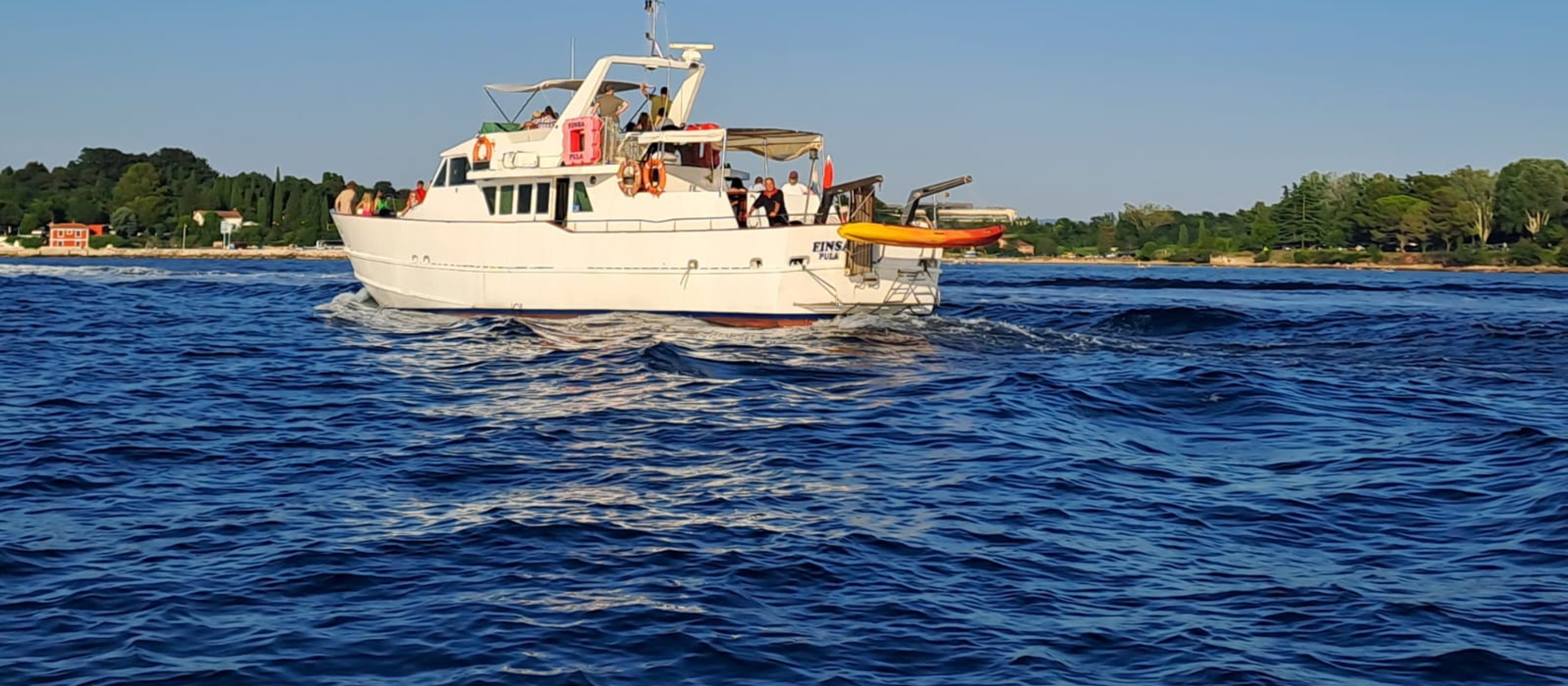 UmagSonnenuntergangsfahrt mit Delfinbeobachtung