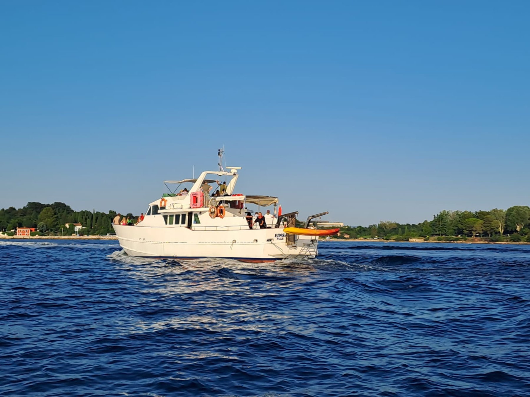 UmagSonnenuntergangsfahrt mit Delfinbeobachtung