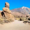 Teide and rock formations on sandy path