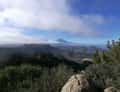 Teide above clouds from mountain ridge