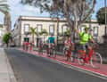 Cyclists on bike lane in town