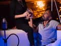 Couple with wine at night