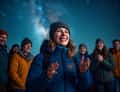 Guests under Milky Way, joyful