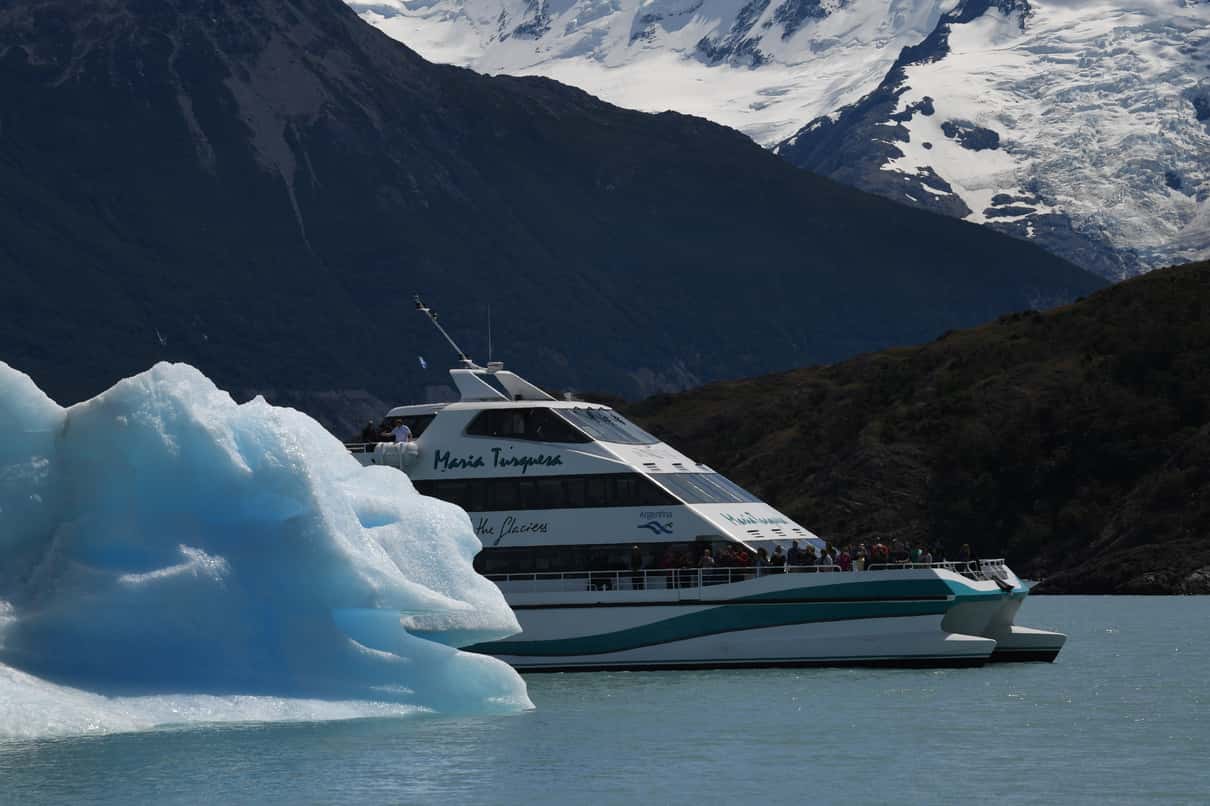 Premium catamaran cruising past icebergs in the Upsala Canal, Los Glaciares National Park
