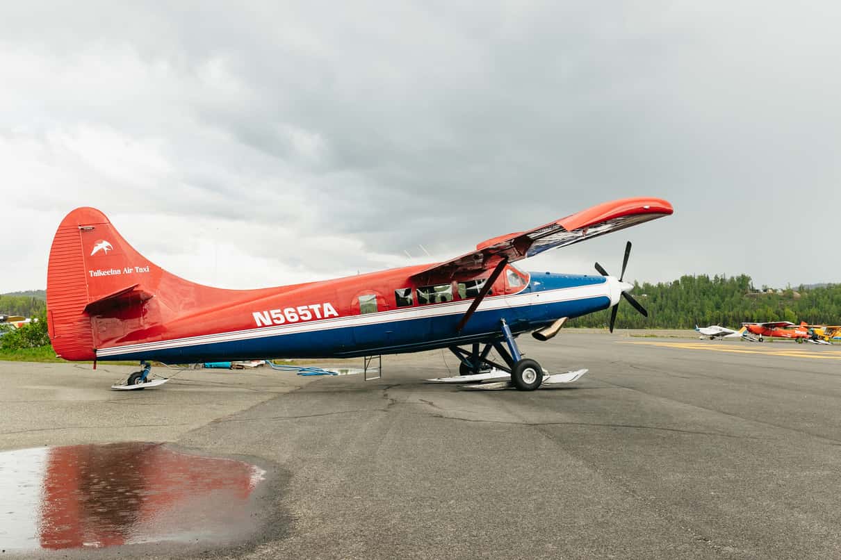 Small sightseeing plane flying over Denali and the glaciers of the Alaska Range