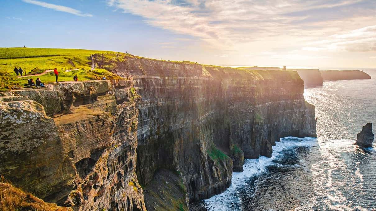 Coach tour group at the Cliffs of Moher visitor centre in County Clare