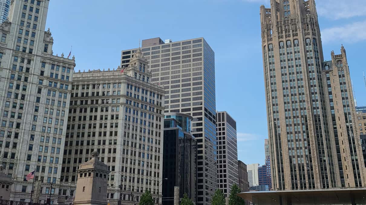 The white Wrigley Building and the Gothic Tribune Tower on either side of the Michigan Avenue bridge