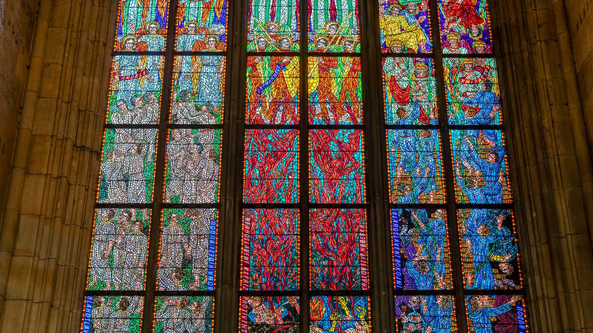 The colorful Alfons Mucha stained-glass window inside St. Vitus Cathedral at Prague Castle