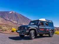 Dark SUV in front of Teide