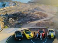 Mustangs on viewpoint circle with guests