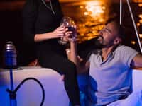 Couple with wine at night
