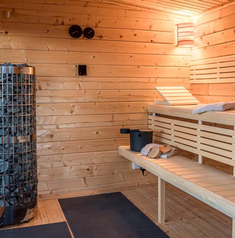 Outdoor private sauna, whirlpool, and spa at Liebevoll hinterm Deich