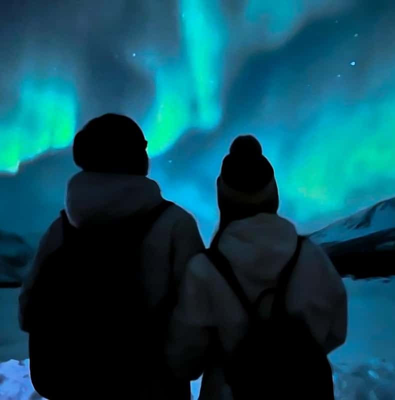 Tromsø: Northern Lights Expedition Tour by bus + Pro Photos