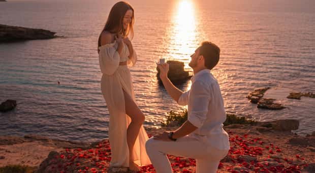Sunset proposal picnic by the sea