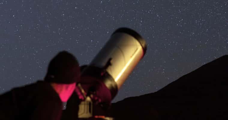 Telescope at night, silhouette