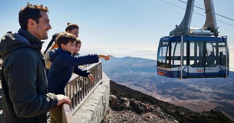 Cable car cabin, family pointing from platform
