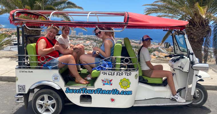 Tuk-tuk with tourists on seafront