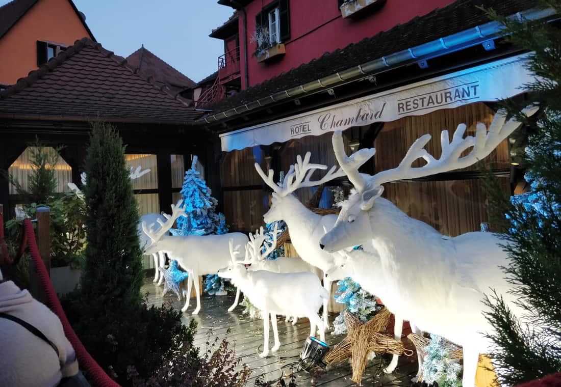 White reindeer decorations outside a restaurant — Alsace villages