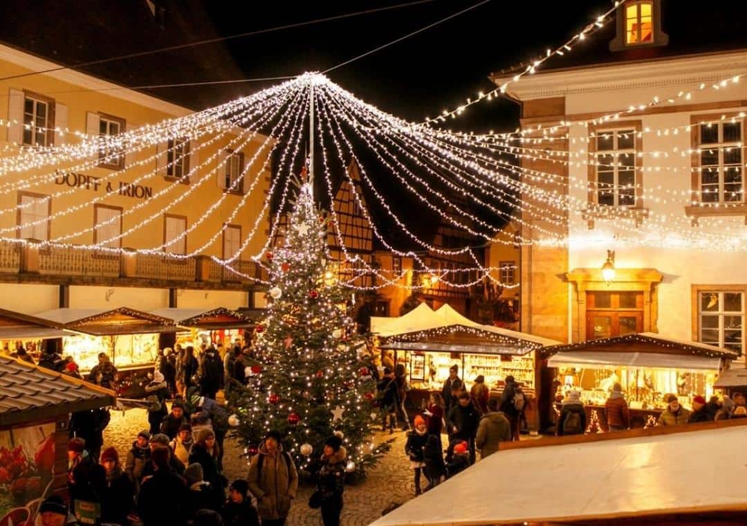 A village Christmas market at dusk — Alsace villages