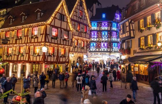 Evening crowd in Colmar old town on the day trip from Basel