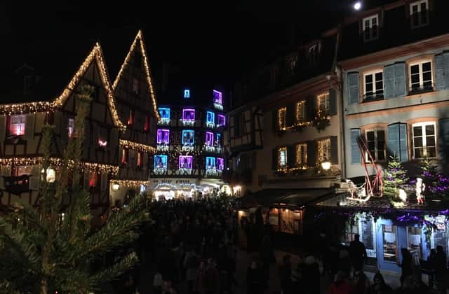Half-timbered houses lit at night on the three-borders tour