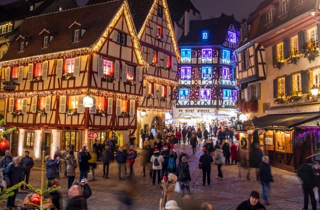 Evening crowd in Colmar old town on the day trip from Basel